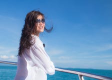 Attractive Asian Girl Relaxing On A Yacht Royalty Free Stock Photos Attractive Asian Girl Relaxing On A Yacht Royalty Free Stock Photos