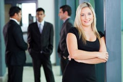 Attractive blond corporate worker in office stock image Attractive blond corporate worker in office stock image