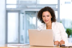 Attractive Business Woman Working On Laptop Royalty Free Stock Photography