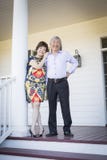 Attractive Chinese Couple Enjoying Their House stock photography Attractive Chinese Couple Enjoying Their House stock photography