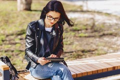 attractive girl in glasses with tablet at park royalty free stock images attractive girl in glasses with tablet at park royalty free stock images