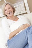 Attractive Happy Senior Woman Laughing at Home stock photos Attractive Happy Senior Woman Laughing at Home stock photos