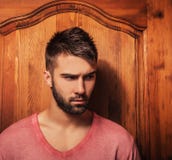 Attractive men indoor. Close-up photo. stock image Attractive men indoor. Close-up photo. stock image