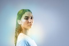 Attractive model standing isolated on grey stock image Attractive model standing isolated on grey stock image
