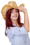 Attractive redhead girl with straw hat, isolated Stock Photography Attractive redhead girl with straw hat, isolated Stock Photography