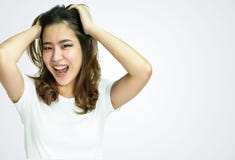 A woman wearing white tshirt on white background royalty free stock photography A woman wearing white tshirt on white background royalty free stock photography