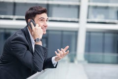 Attractive young businessman is communication on royalty free stock image Attractive young businessman is communication on royalty free stock image