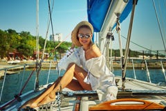 Attractive Young Woman On A Yacht On A Summer Day. Royalty Free Stock Image