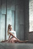 Attractive young woman practicing in dance studio stock images Attractive young woman practicing in dance studio stock images