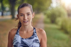 Attractive young woman in sports attire royalty free stock images Attractive young woman in sports attire royalty free stock images