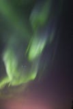 Aurora borealis over town lights glow royalty free stock image Aurora borealis over town lights glow royalty free stock image