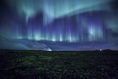 Aurora over mossy Icelandic Lava Field