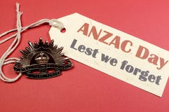 Australian ANZAC Day WW1 Rising Sun Hat Badge With Lest We Forget Message Stock Image