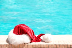 Authentic Santa Claus Hat Near Pool Royalty Free Stock Photo Authentic Santa Claus Hat Near Pool Royalty Free Stock Photo