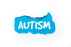 Autisme, het woord op een gescheurde witte achtergrond stock foto Autisme, het woord op een gescheurde witte achtergrond stock foto