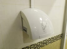 Automatische Toilette des Handtrockners öffentlich lizenzfreie stockbilder Automatische Toilette des Handtrockners öffentlich lizenzfreie stockbilder