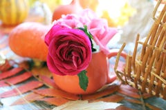 Autumn Composition Of Pumpkins, Fresh Roses In A Cup, Leaves On A Windowsill Stock Photos Autumn Composition Of Pumpkins, Fresh Roses In A Cup, Leaves On A Windowsill Stock Photos