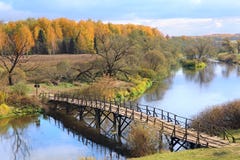 Autumn Landscape With River And Wooden Bridge Royalty Free Stock Image