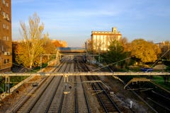 Autumn sunset, view of train tracks near Alcala de Henares stati. Sunset view of train tracks near Alcala de Henares station, Madird, Spain Royalty Free Stock Photography Autumn sunset, view of train tracks near Alcala de Henares stati. Sunset view of train tracks near Alcala de Henares station, Madird, Spain Royalty Free Stock Photography