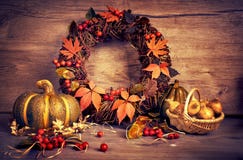 Autumn wreath and still life with pumpkin and onions on wood royalty free stock photos Autumn wreath and still life with pumpkin and onions on wood royalty free stock photos