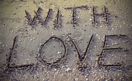 Avec amour écrit sur la plage photo stock Avec amour écrit sur la plage photo stock
