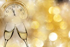 Año Nuevo en la medianoche - viejas luces del reloj y del día de fiesta Fotos de archivo libres de regalías