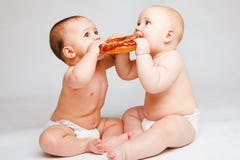 Babies With Bread Stock Photography