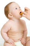 Baby boy feeding isolated with parent hand stock photo Baby boy feeding isolated with parent hand stock photo