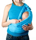 Baby in einem Riemen stockfoto Baby in einem Riemen stockfoto