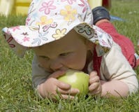 Baby Eating A Green Apple Stock Photos Baby Eating A Green Apple Stock Photos