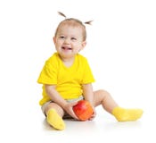 Baby eating apple sitting isolated stock photo Baby eating apple sitting isolated stock photo