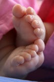 Baby Feet And Pink Pants Royalty Free Stock Photo