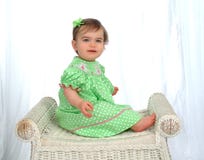 Baby Girl In Polka Dot Dress Stock Photo