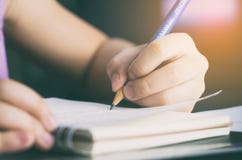 Baby girl is learning how to write royalty free stock photography Baby girl is learning how to write royalty free stock photography