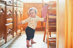 Baby Girl Learning To Stand Royalty Free Stock Photos