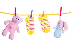 Baby goods hanging on the clothesline stock image Baby goods hanging on the clothesline stock image