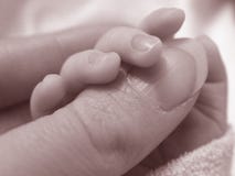 Baby Holding Ladies Thumb Baby Holding Ladies Thumb