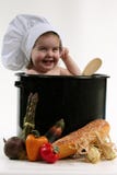 Baby In A Chef Pot Stock Photo