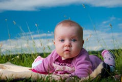 Baby On A Carpet Stock Images