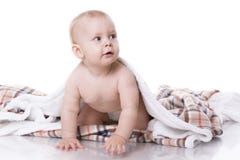 Baby playing on plaid Royalty Free Stock Photos Baby playing on plaid Royalty Free Stock Photos