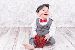 Baby with red kiss and heart Stock Photography Baby with red kiss and heart Stock Photography