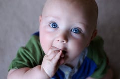 Baby With Huge Blue Eyes Royalty Free Stock Photography