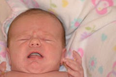 Babyschreeuw stock afbeelding Babyschreeuw stock afbeelding