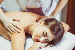 A back massage in the salon royalty free stock images A back massage in the salon royalty free stock images