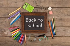 Back to school concept - school supplies on the wooden desk Stock Image Back to school concept - school supplies on the wooden desk Stock Image