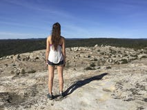 Young woman hiker looking at horizon royalty free stock photos Young woman hiker looking at horizon royalty free stock photos