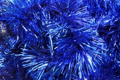 The background of Christmas tinsel blue royalty free stock image The background of Christmas tinsel blue royalty free stock image