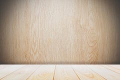 Background with empty wooden deck table over grunge cement wall, vintage, background, template, display stock images Background with empty wooden deck table over grunge cement wall, vintage, background, template, display stock images