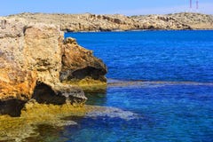 Background landscape view of the rocky coast in the reserve at Cape Capo Greco, Protaras royalty free stock images Background landscape view of the rocky coast in the reserve at Cape Capo Greco, Protaras royalty free stock images