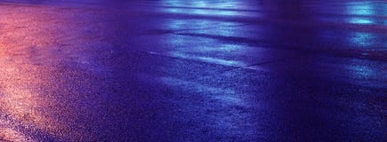 Background Of Wet Asphalt With Neon Light. Blurred Background, Night Lights, Reflection. Stock Photography